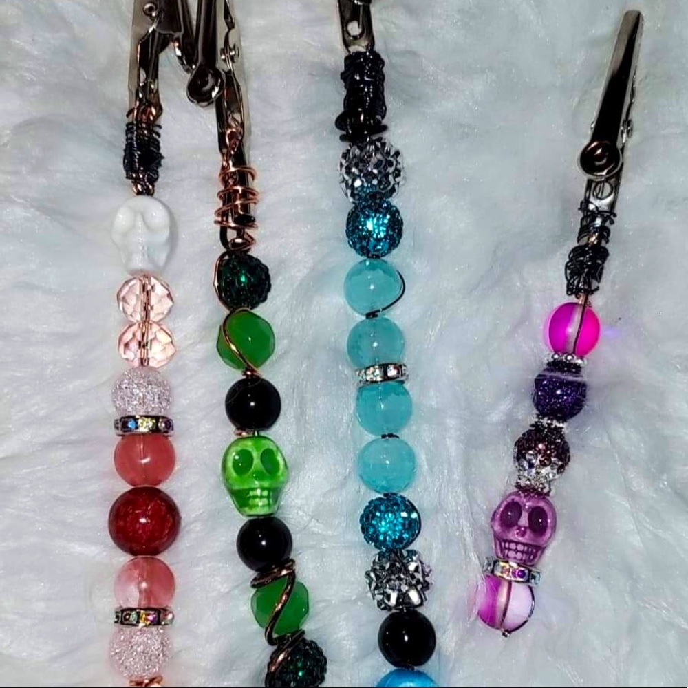 Glass beaded wire wrapped skull roach clip